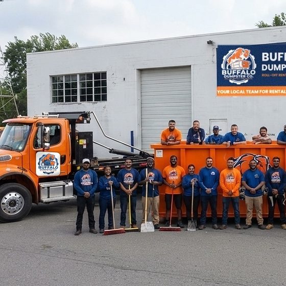 Buffalo Dumpster Co. roll-off truck and crew with a 30-yard container outside the Walden Avenue shop
